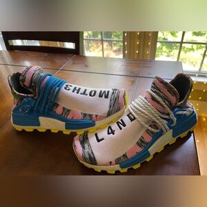 Never worn size 9 Adidas Human Race Moth3r land